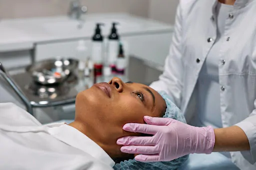 Woman Receiving Face Treatment